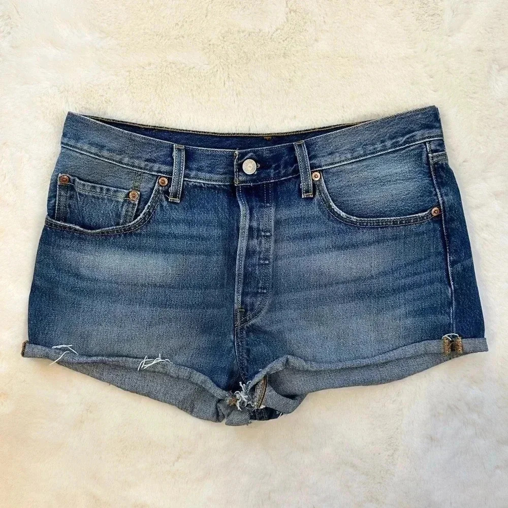 Levi’s 501 button up denim shorts with rolled hemline.
